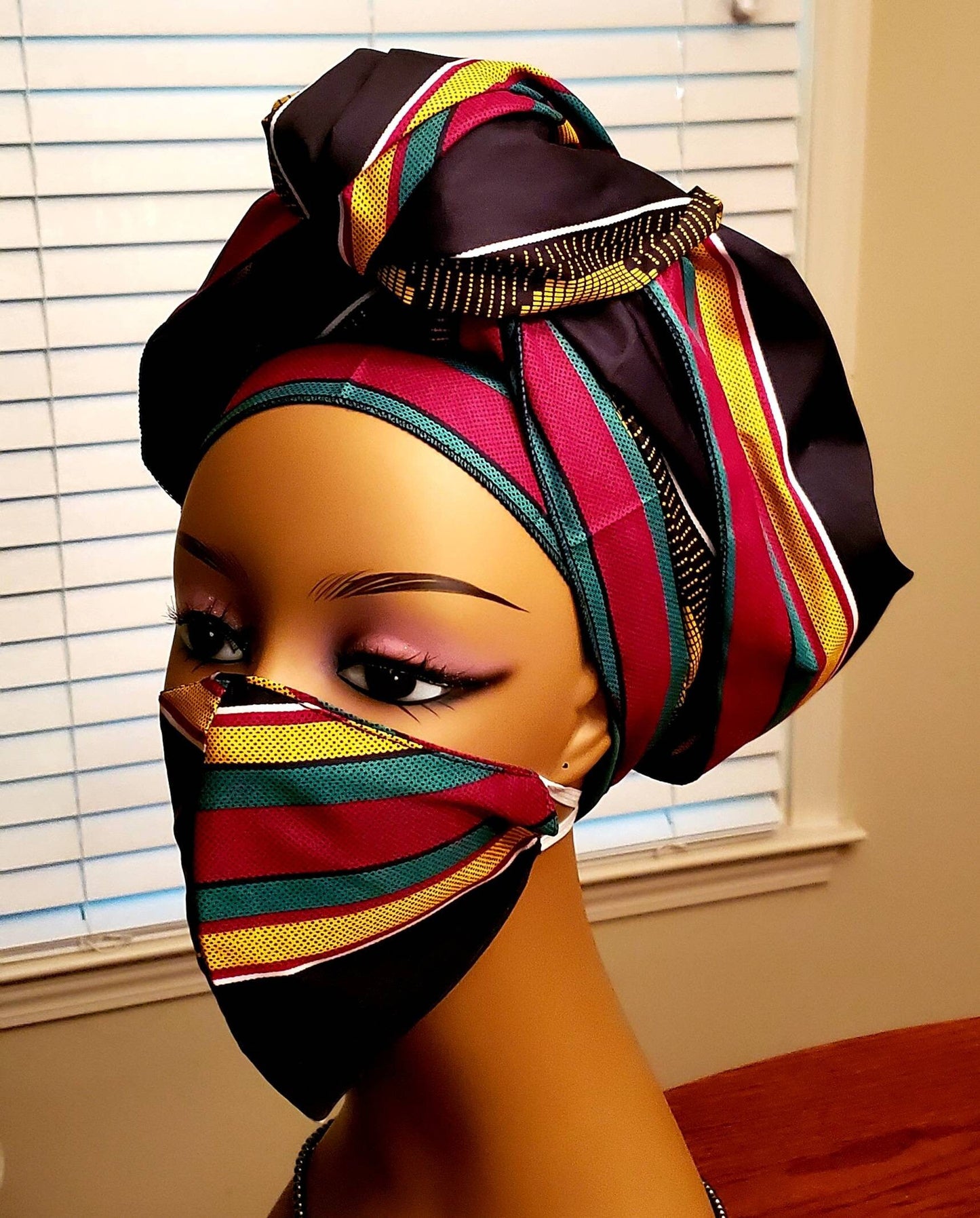 Traditional Kente Headwraps, no masks.