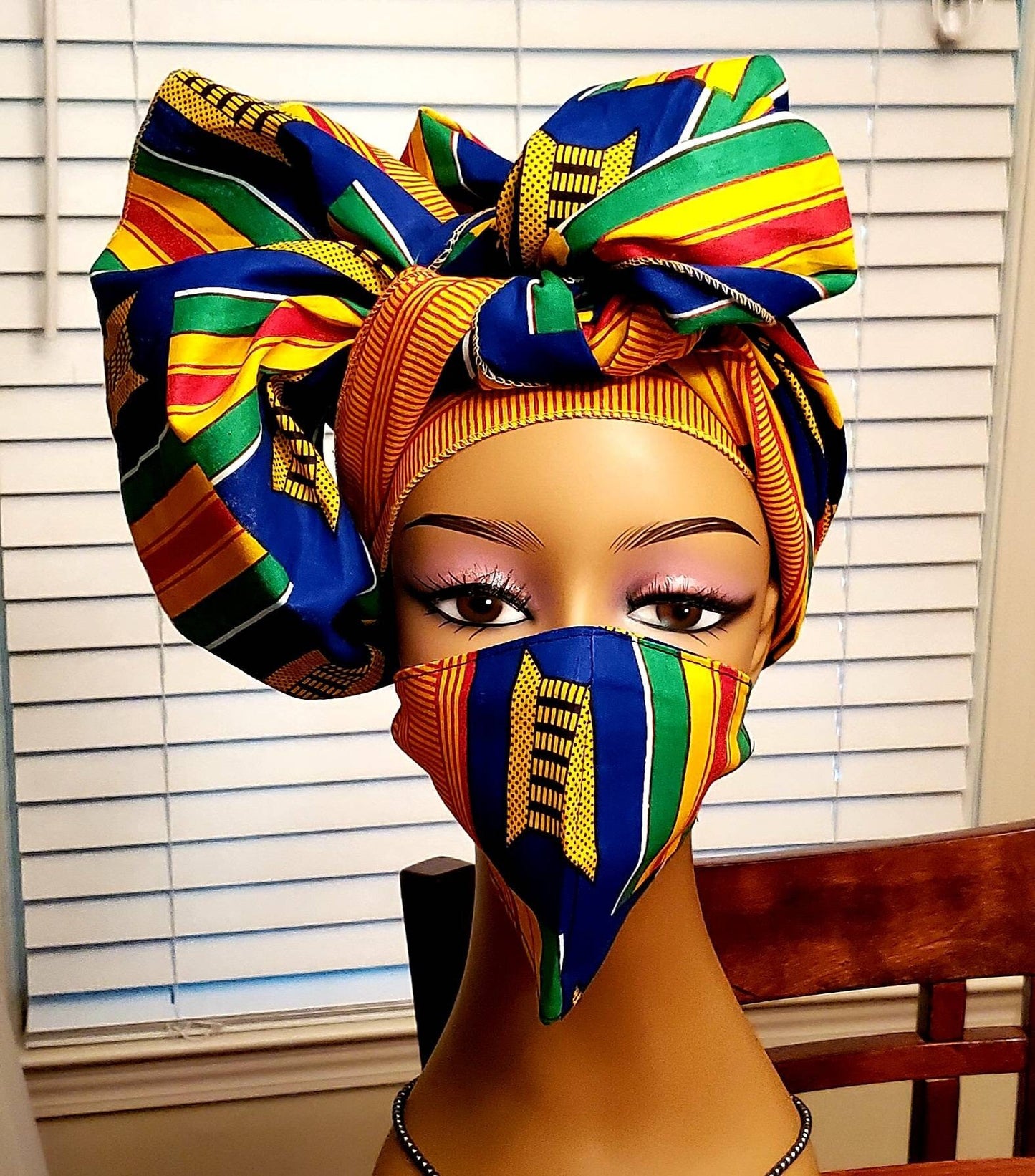Traditional Kente Headwraps, no masks.