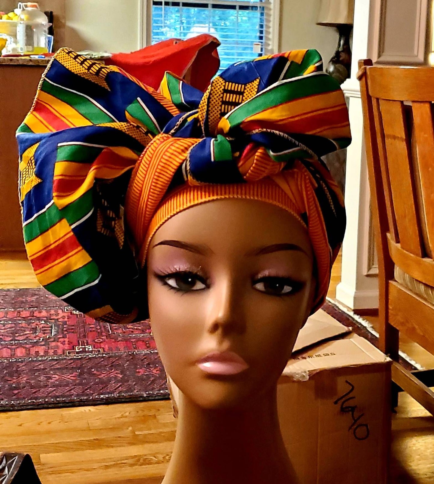 Traditional Kente Headwraps, no masks.