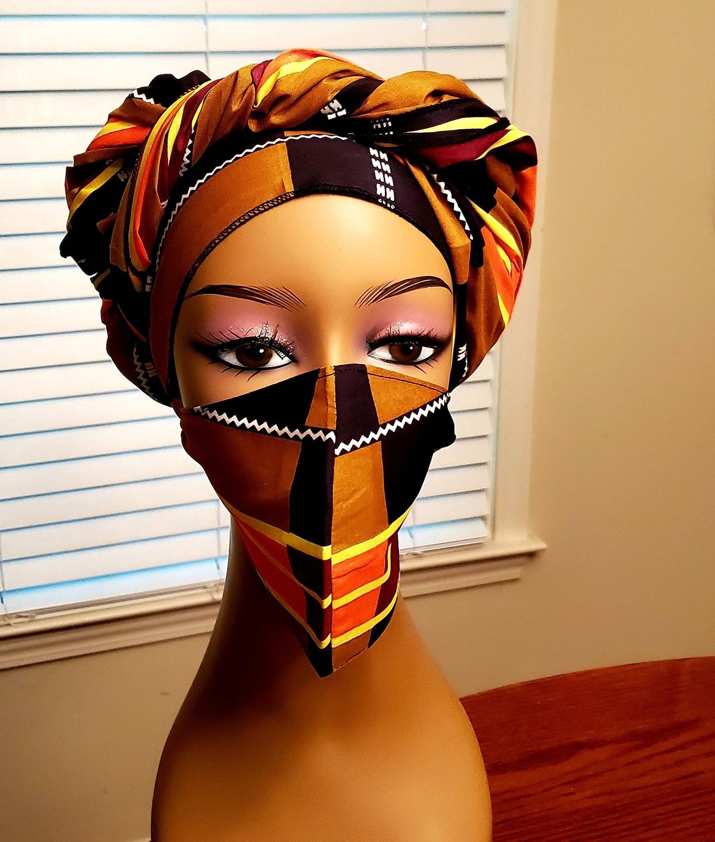Traditional Kente Headwraps, no masks.