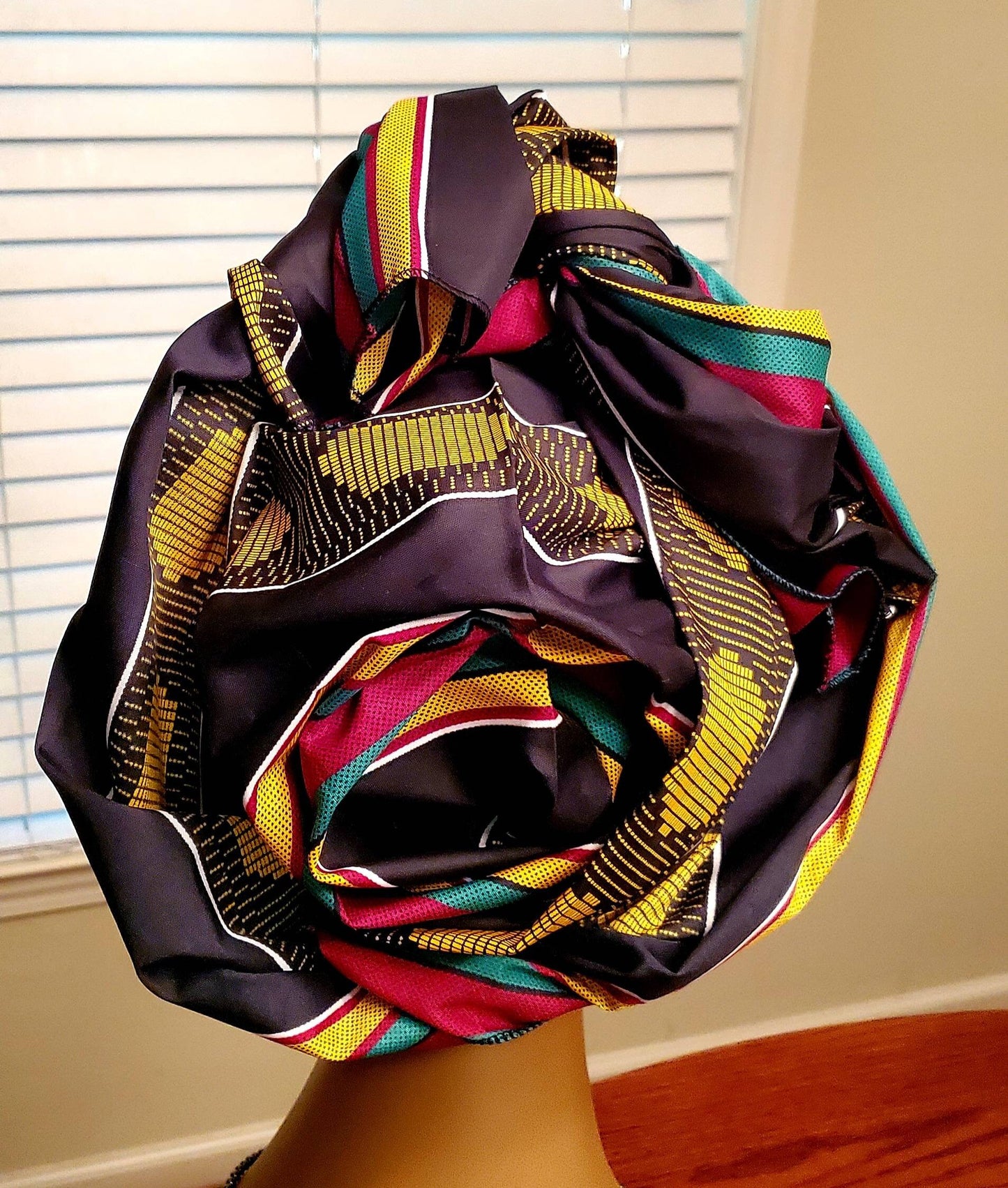 Traditional Kente Headwraps, no masks.