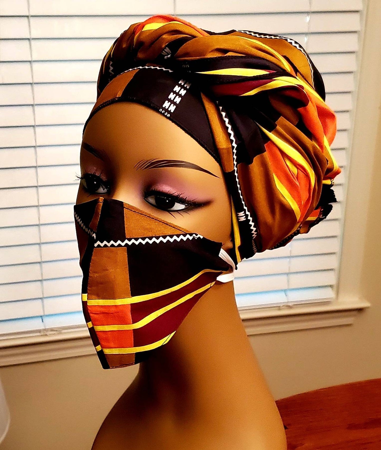Traditional Kente Headwraps, no masks.