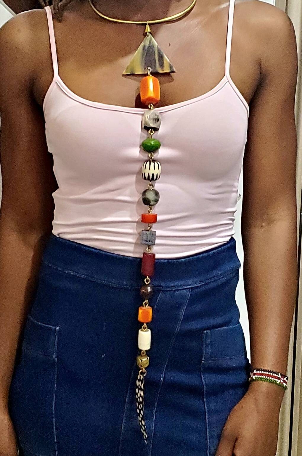 African Inspired long Batik Bone/Horn chunky beaded necklace. Length is from 19 to 22 inches.