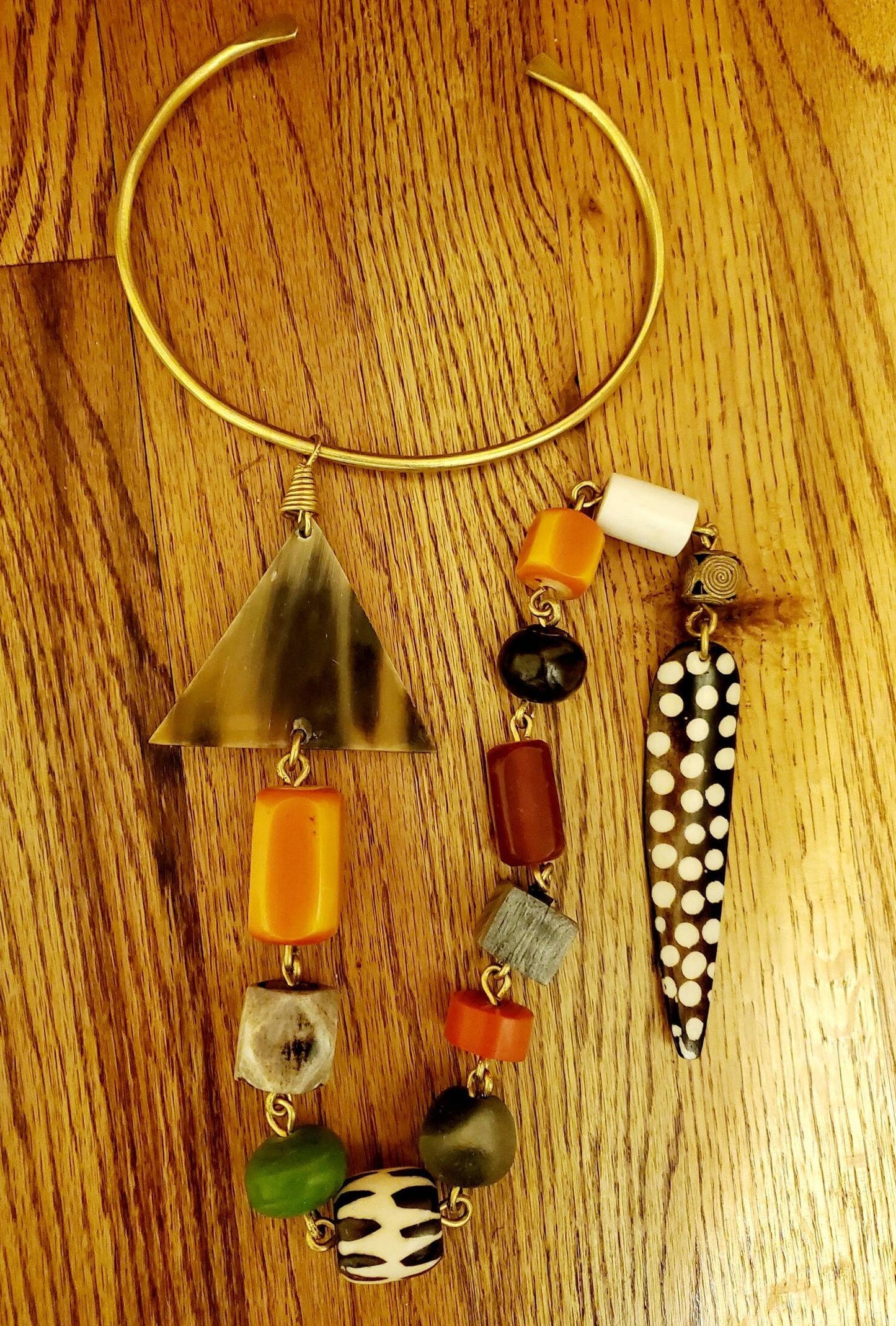 African Inspired long Batik Bone/Horn chunky beaded necklace. Length is from 19 to 22 inches.