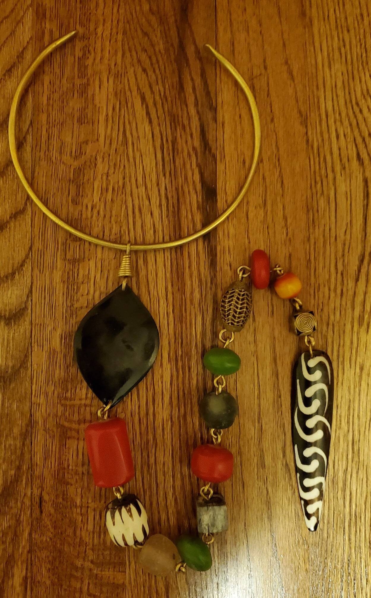 African Inspired long Batik Bone/Horn chunky beaded necklace. Length is from 19 to 22 inches.