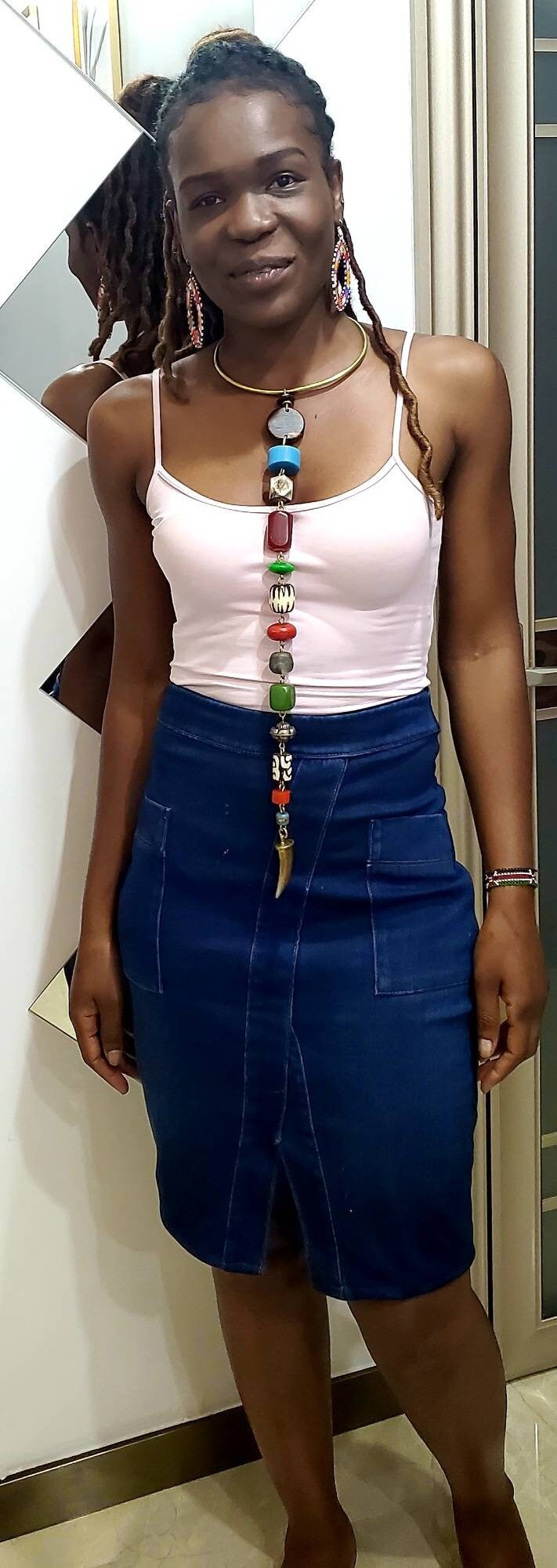 African Inspired long Batik Bone/Horn chunky beaded necklace. Length is from 19 to 22 inches.