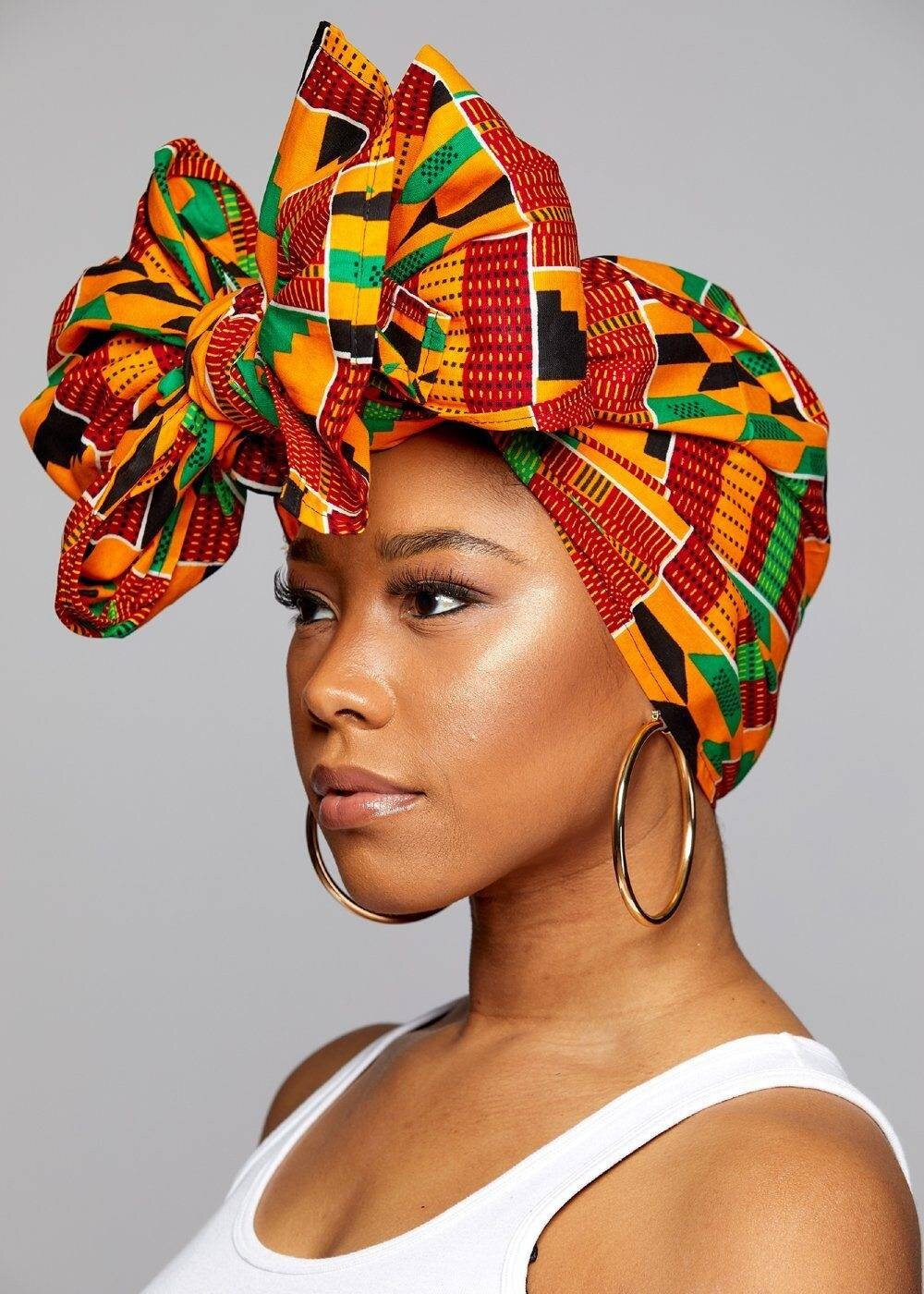 Traditional Kente Headwraps, no masks.