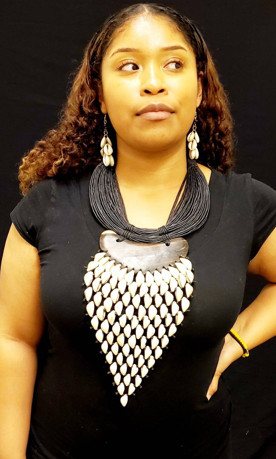 Huge V Cowrie on Ebony Wood Necklace. Length 12 inches.