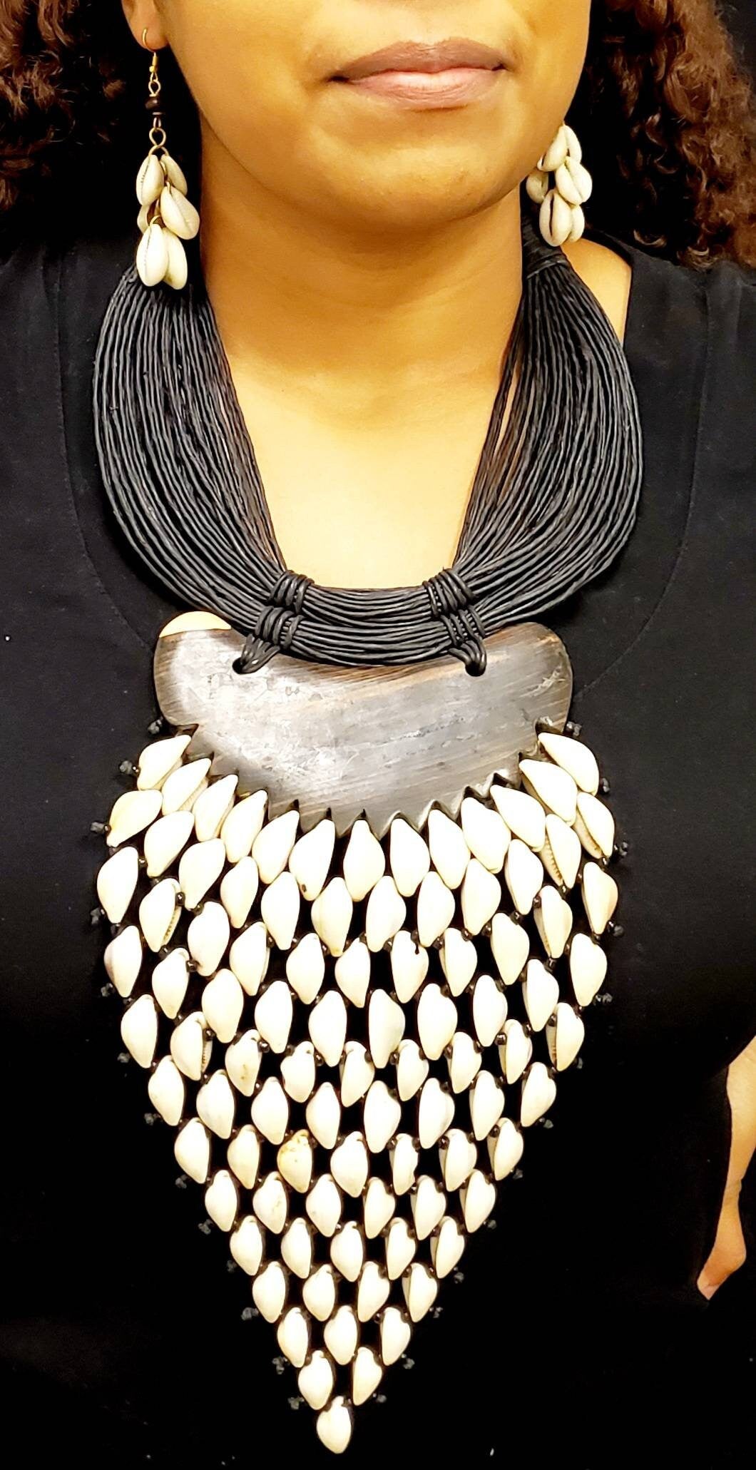 Huge V Cowrie on Ebony Wood Necklace. Length 12 inches.