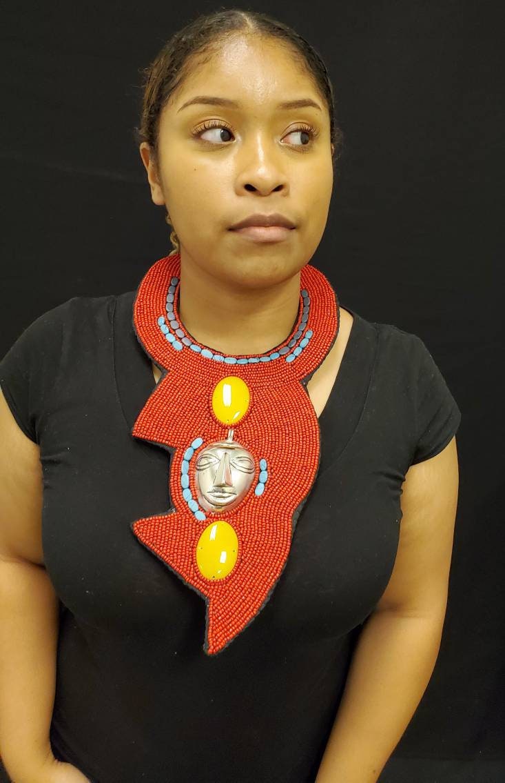 African Bibb Necklace with a mask. 10 inches.