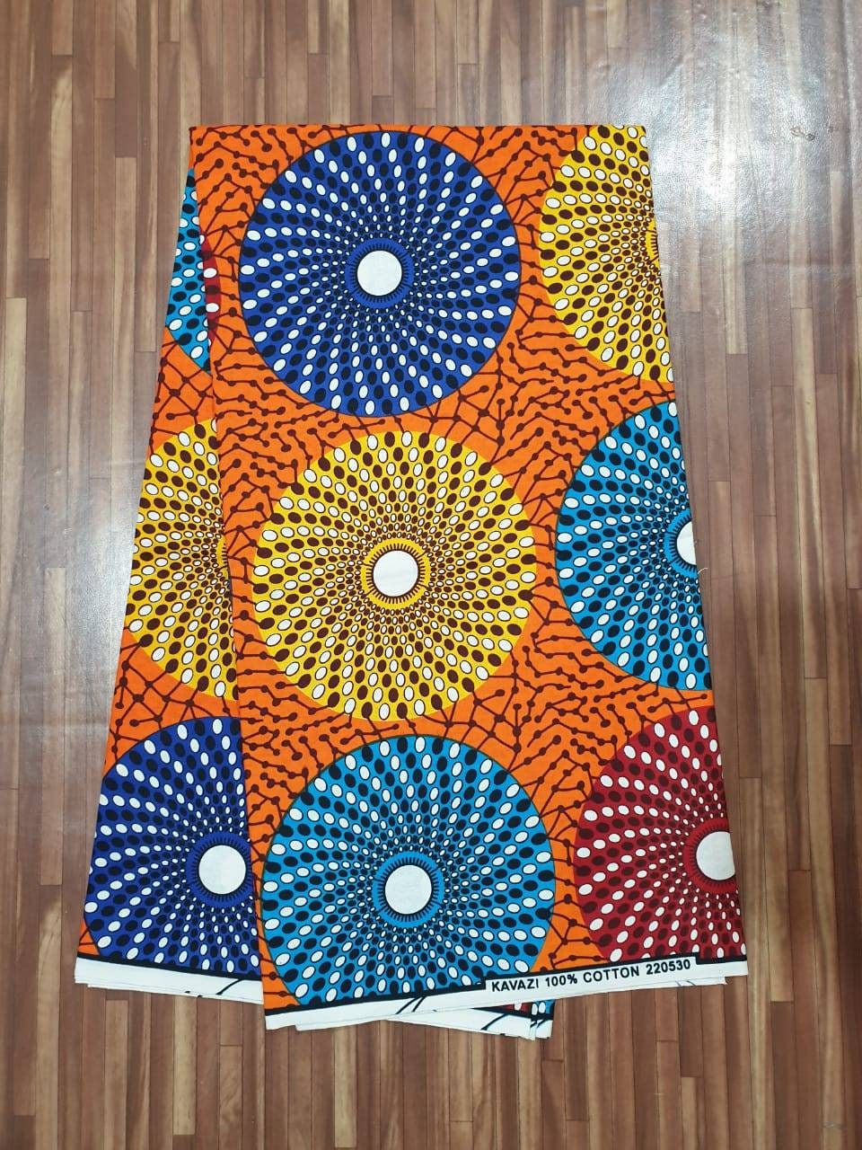 African Print Ankara circles Orange Blue Red. Sold by yard/6 Yards.