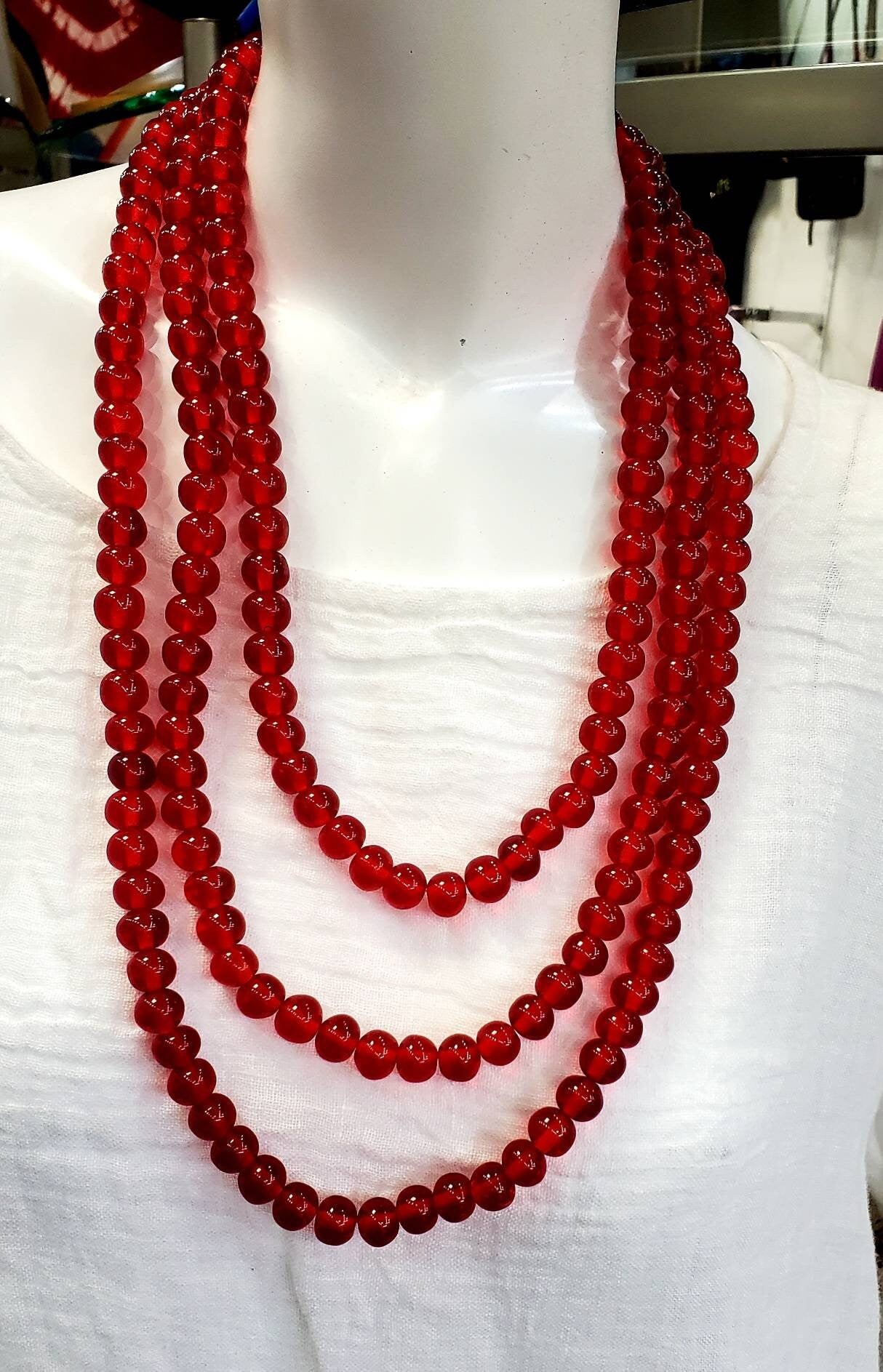 Red Multistrand Beaded Necklace Set.