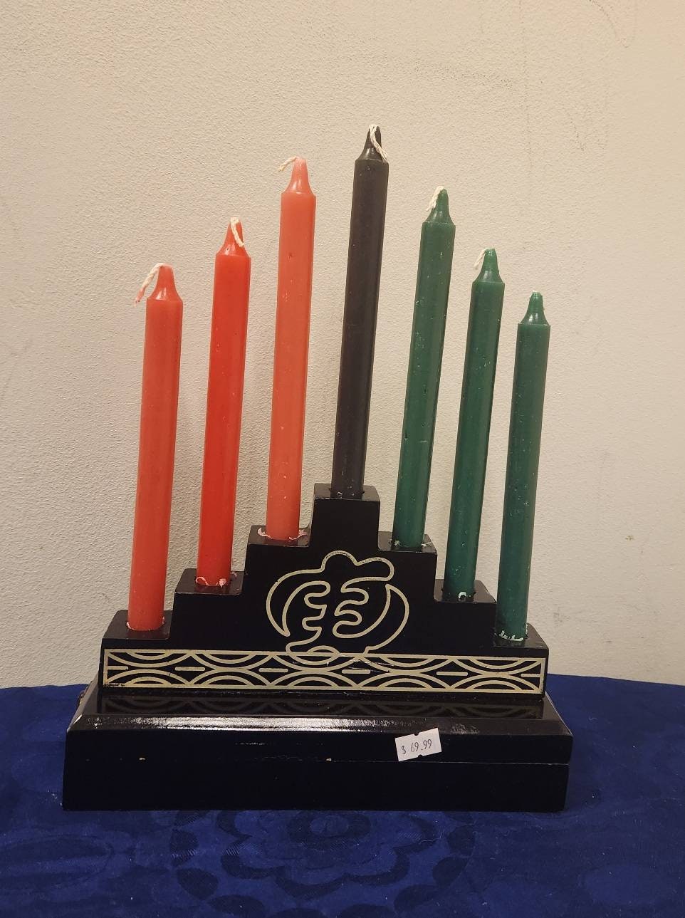 Kwanzaa Kinara Set (Gyenyame) with candles.