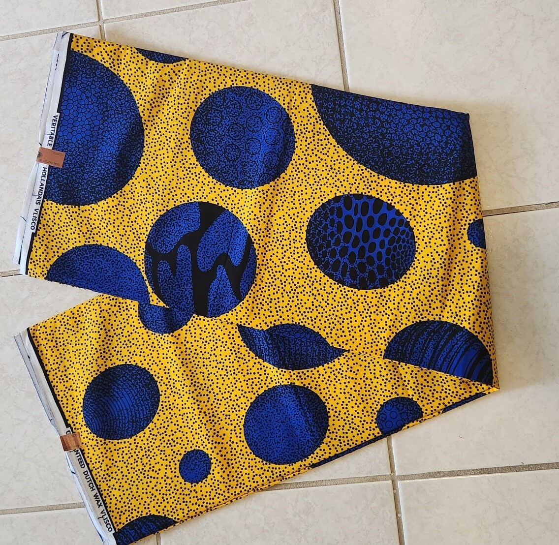 African Print Ankara featuring Multicolor Blue Polka dot in yellow . Sold by yard/6 Yards.