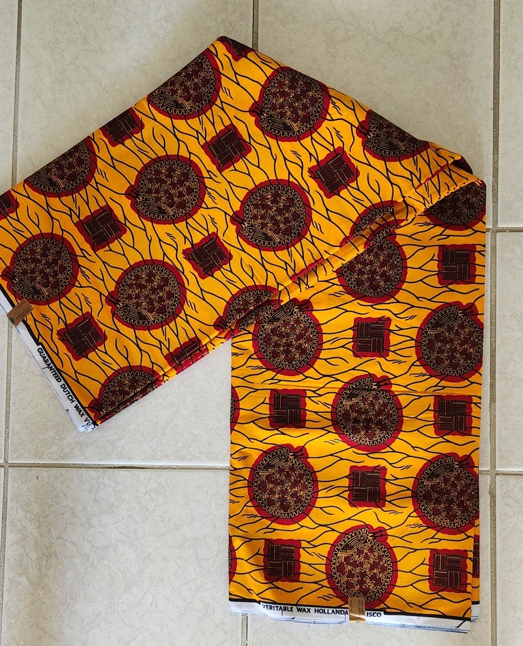 African Print Burgundy and Gold 100% Cotton/sold per yd or 6 yards.