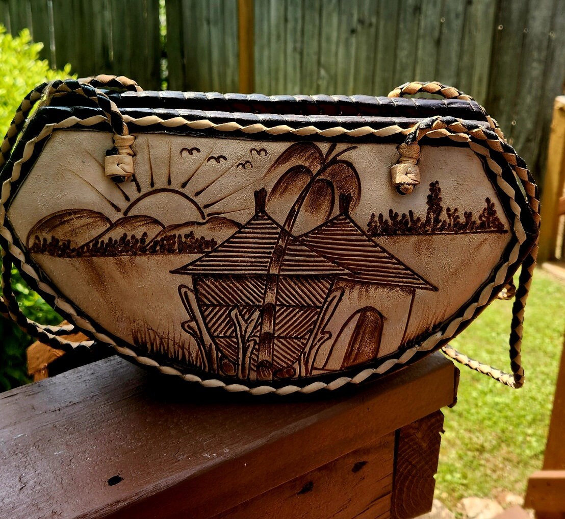 Small Round Bottom Burkina Rafia Purse/African Rafia Bag. Front Leather Art and Zipper Closure.