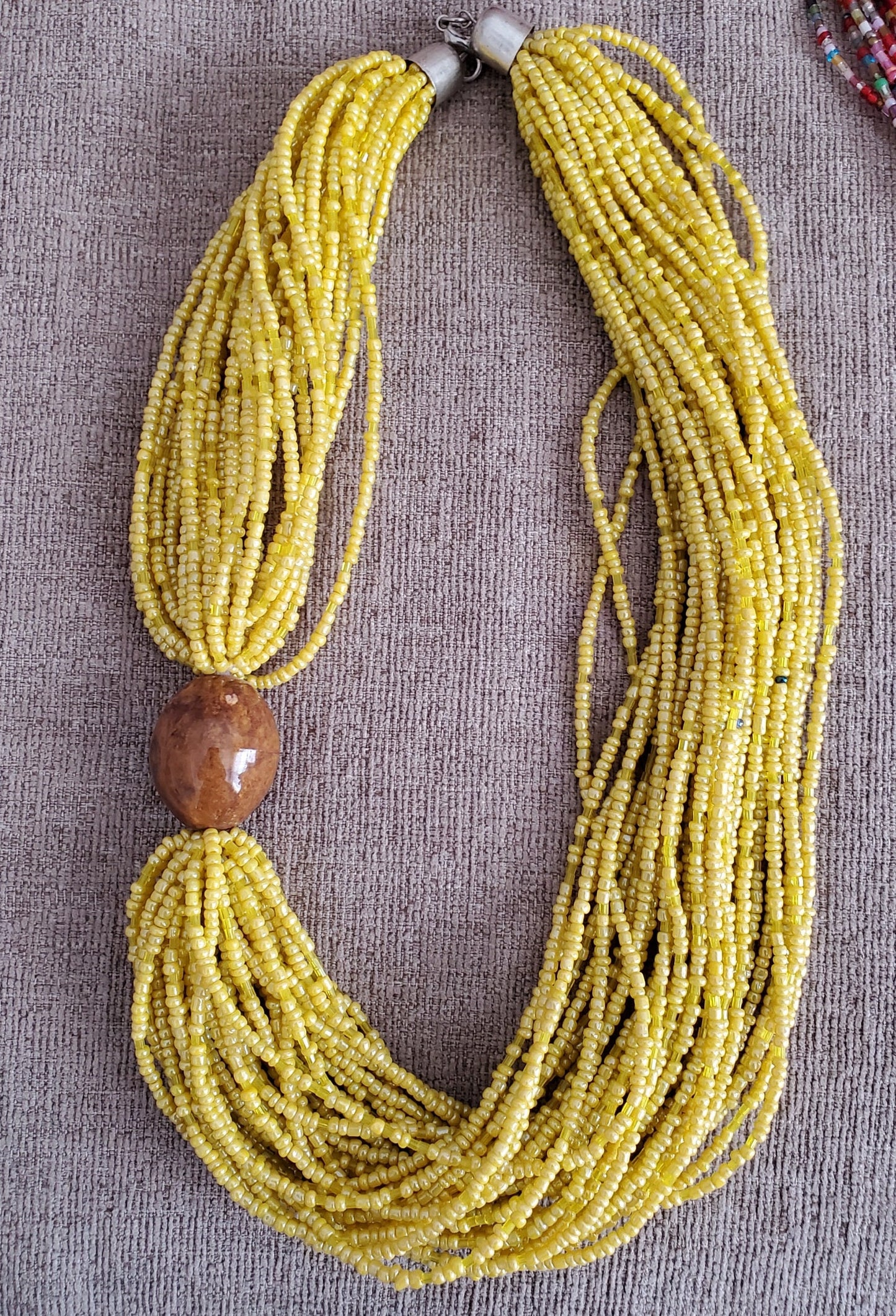 African Multi Strand Beaded Ethnic Necklace with a wooden button/Tuareg Tribal necklace made in Mali.