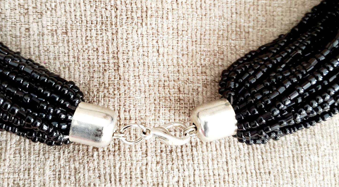 African Multi Strand Beaded Ethnic Necklace with a wooden button/Tuareg Tribal necklace made in Mali.