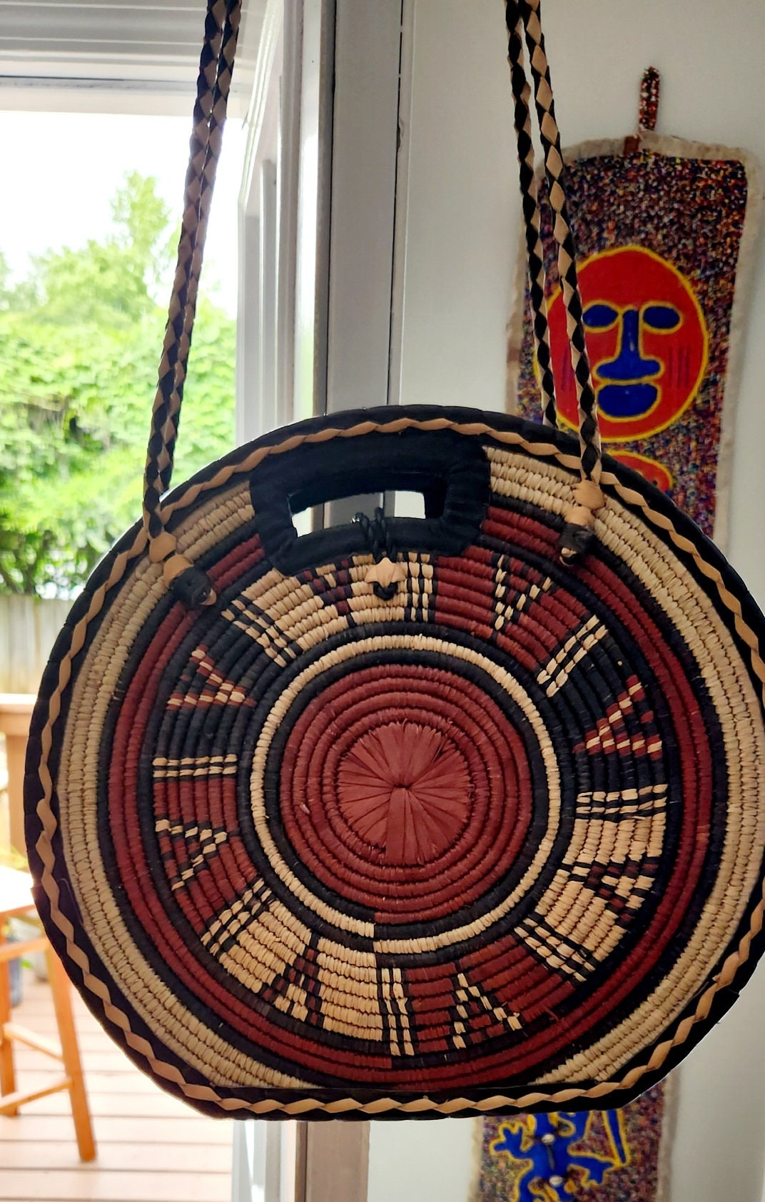 Burkina Flat Bottom Rafia Purse/African Rafia Bag/ Handcraftedin Burkina Faso. Front Leather Art and Zipper Closure with a handle.