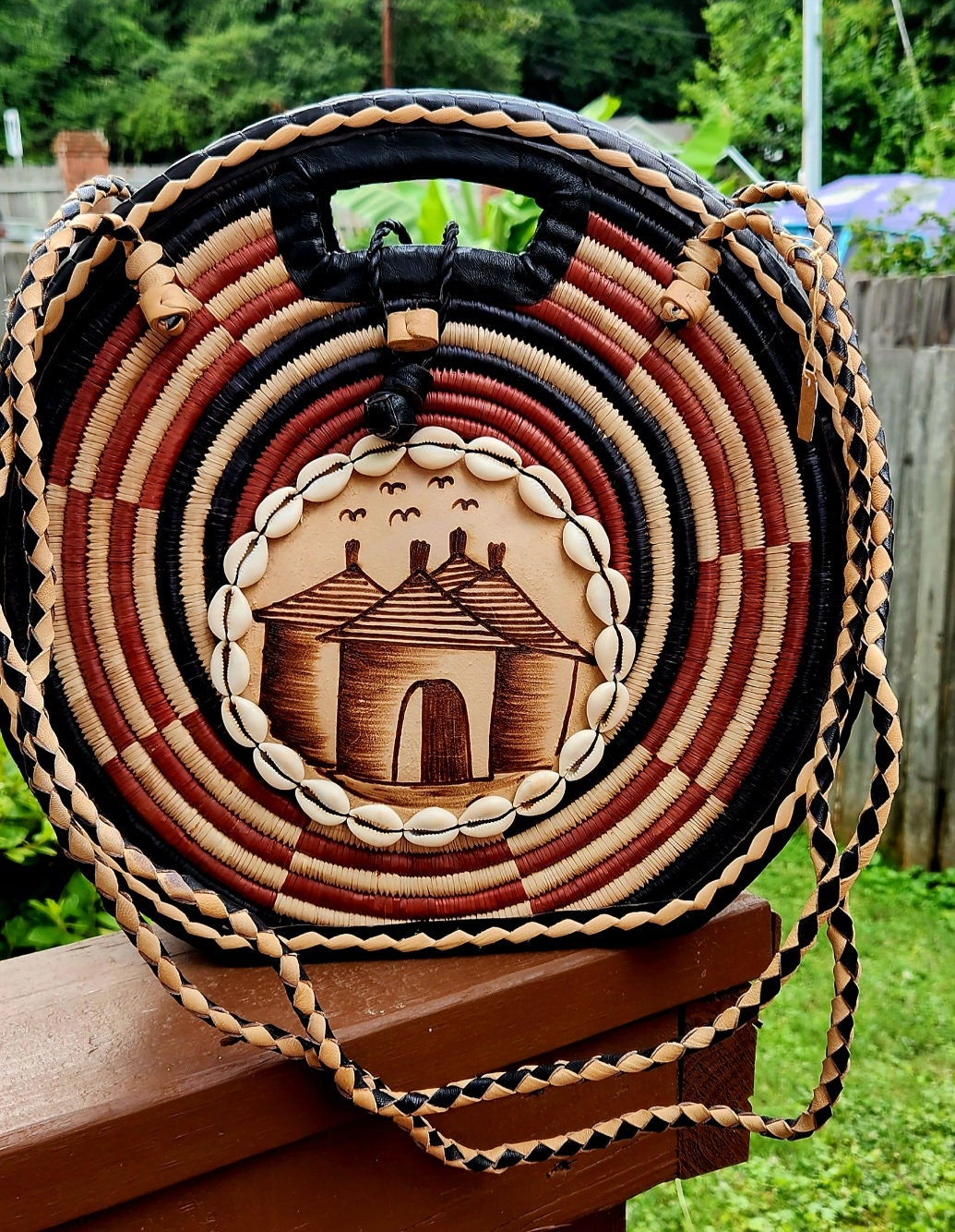 Burkina Flat Bottom Rafia Purse/African Rafia Bag/ Handcraftedin Burkina Faso. Front Leather Art and Zipper Closure with a handle.