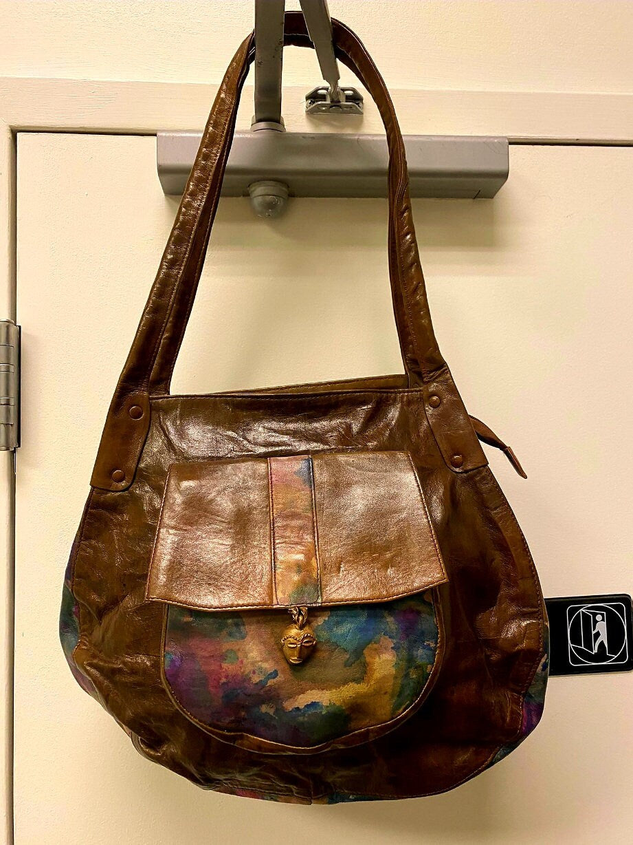 African Leather Purse/Handcrafted GyeNyame bag lined with Ankara.