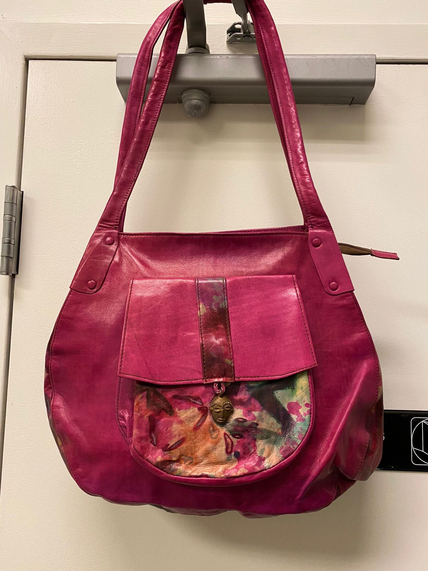 African Leather Purse/Handcrafted GyeNyame bag lined with Ankara.