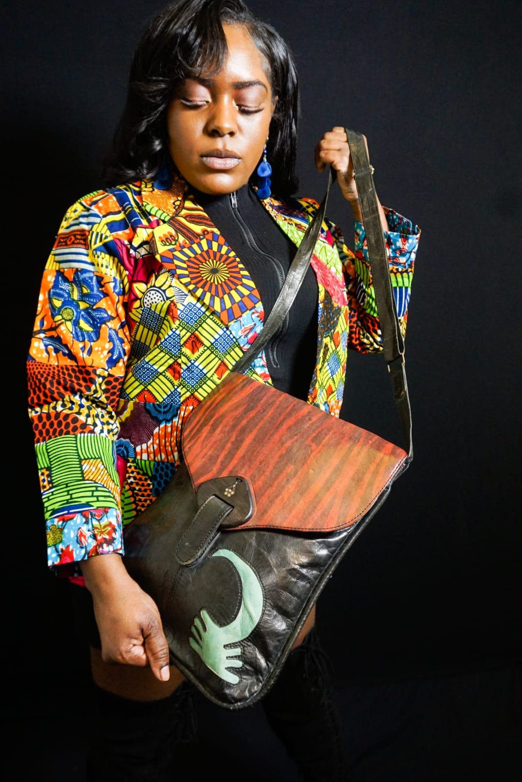 Crossbody Leather Bag with adjustable strap and lined with Ankara 19"x15.5".