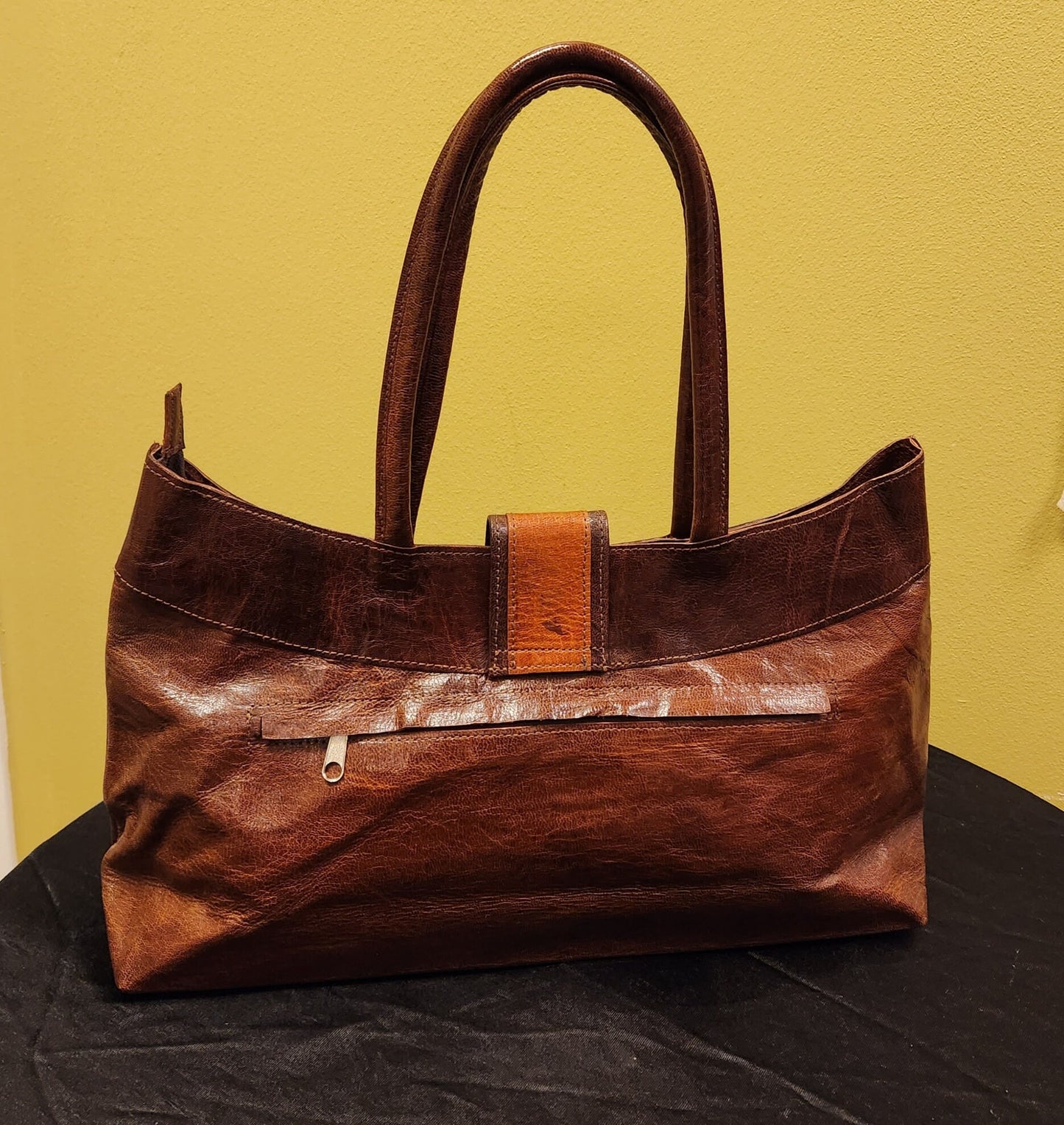 Exclusive African Leather Purse handcrafted with goat Leather and Ebony wood clasp.