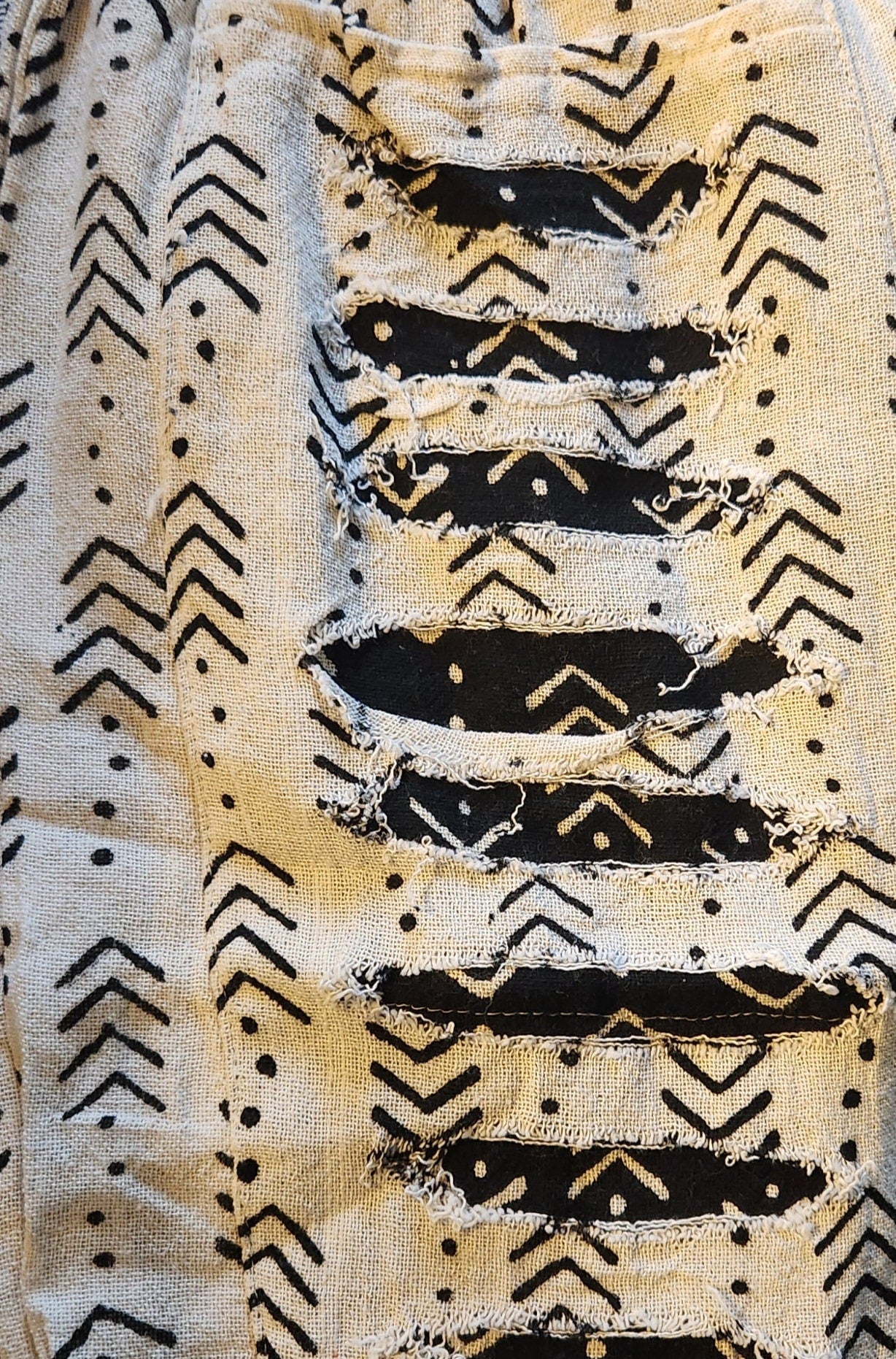 African Mudcloth Print Women's Ripped Pants.