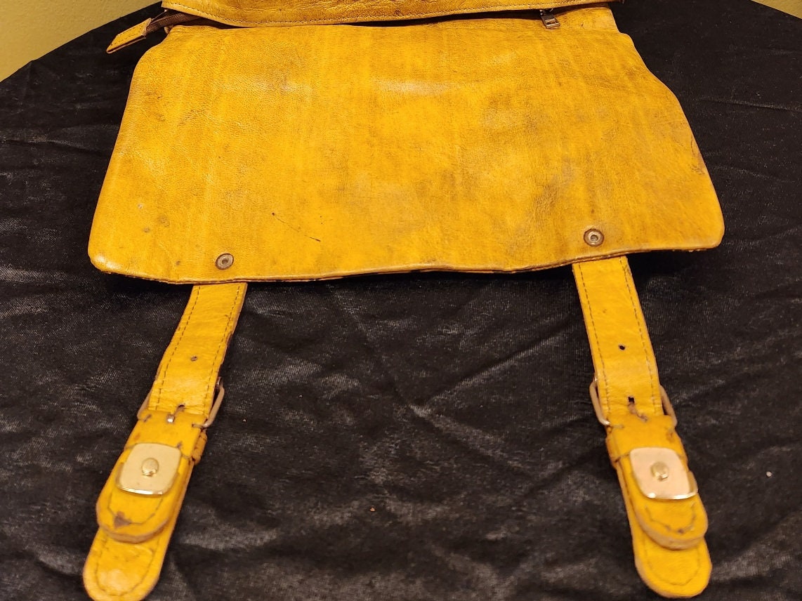 African Leather Backpack with Adinkra Symbols.