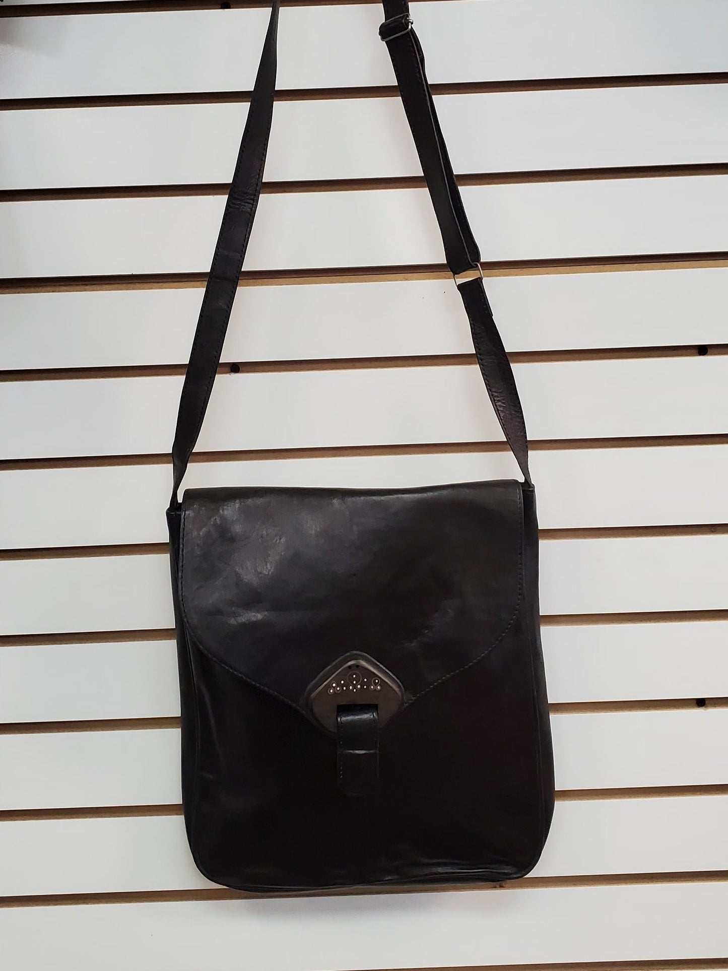 Crossbody Leather Bag with adjustable strap and lined with Ankara 19"x15.5".