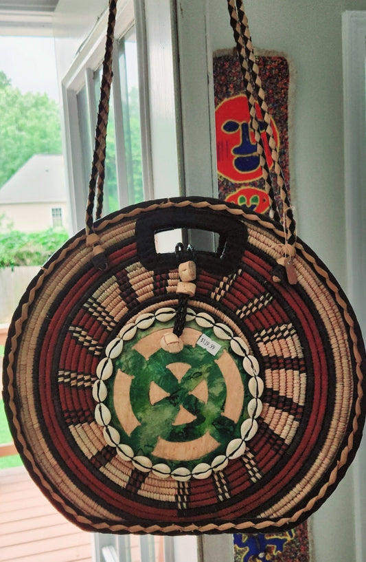 Burkina Flat Bottom Rafia Purse/African Rafia Bag/ Handcraftedin Burkina Faso. Front Leather Art and Zipper Closure with a handle.